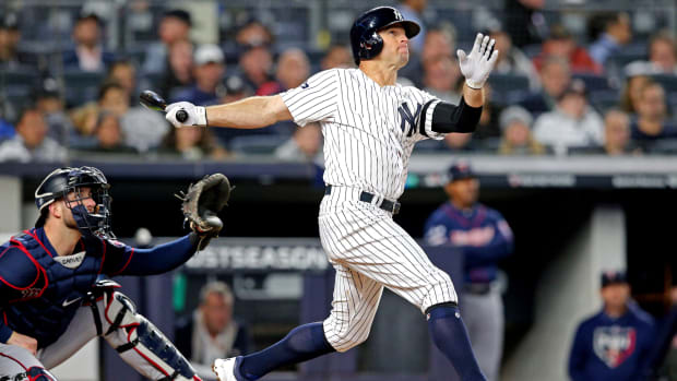 Brett Gardner homers during the American League Division Series against the Minnesota Twins.